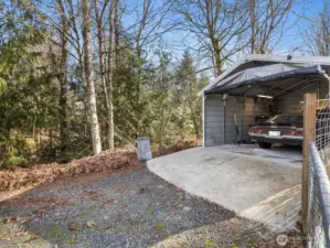 Shop left of home has concrete floor and measures 10' x 20'