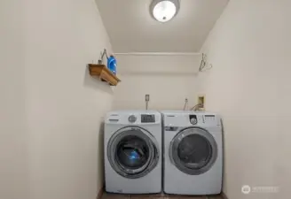 Laundry room next to kitchen.