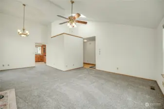 Formal living / dining room with vaulted ceilings