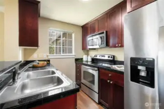 Stainless steel appliances in the kitchen stays.