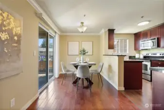 Spacious dining room with sliding door that connects to the balcony.