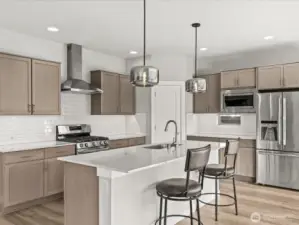 Beautiful modern kitchen awaits your culinary experience.