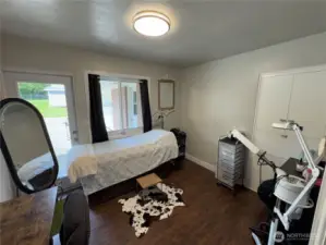 Den or office... door to back patio...