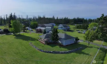 Angle from the easterly edge of the property with the guest home nearest...