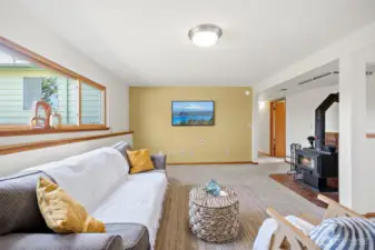 Bonus room has a wood stove and direct access to the backyard.