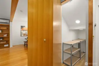 Hidden storage behind the custom wine storage