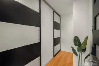 Lower level office has sliding doors for privacy