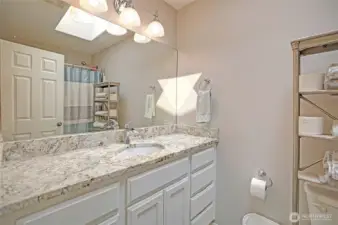 Primary bathroom w/ Granite.