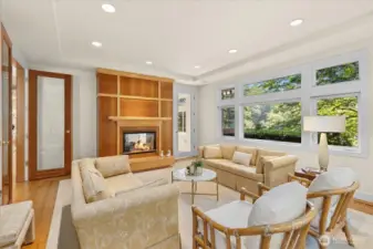 2 sided gas fireplace with custom mantle