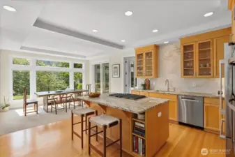 newly refreshed kitchen new blue stone countertops, large format tile walls, new appliances, sinks, faucets