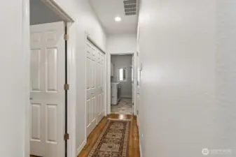 The main floor is completed with the guest ½ bath and laundry room with lots of cabinets and a utility sink.