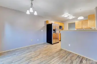 The dining area is open to the kitchen and the family room.