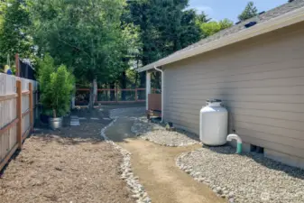 Side yard with crushed granite path