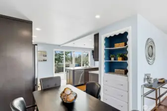 The dining area, opens to kitchen and living room. It can be cozy and intimate or expanded to accommodate a group.