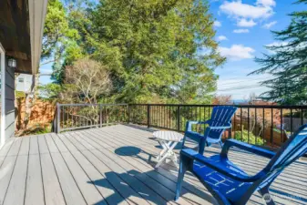 Stairs to the lower yard and patio make the deck easily accessible. It also has a good degree of privacy.