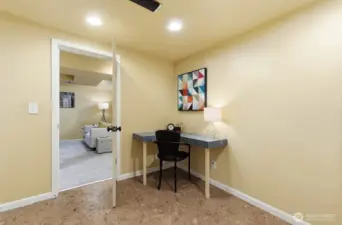 Corner desk in the lower entry makes a great spot for crafts of homework. Cork floors provide a homey warmth.