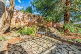 Mature landscape with some great trees and a new fence turns this yard into secure play space or just a spot to unwind in privacy.