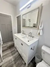 Downstairs primary suite double vanity
