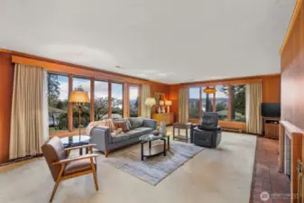 Fall in love w/ the light filled living room, wonderful views and cozy fireplace