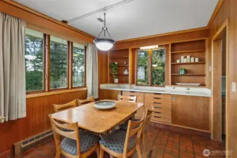 At the end of the large living space you will find the dining area w/built in's