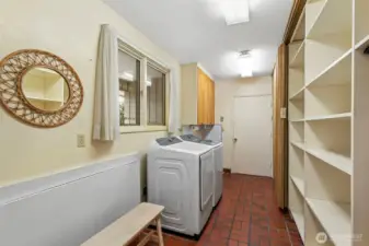 Fabulous utility room with folding table and again substantial storage