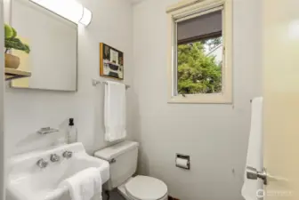 Here is the ½ bath connected to this private space