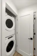 Convenience meets efficiency with an in-unit laundry closet featuring a stackable washer and dryer. Tucked away for easy access, it ensures daily chores are a breeze.