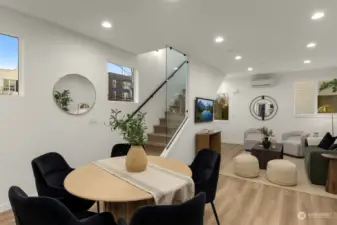 Let natural light fill this warm dining space, where modern design meets comfort.