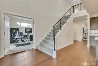 Open staircase and lower level den or bedroom