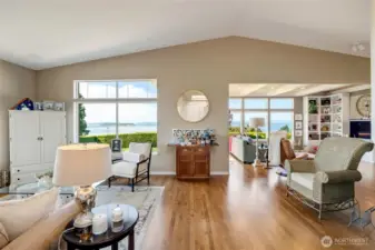 Vaulted ceiling and several windows allow natural light.
