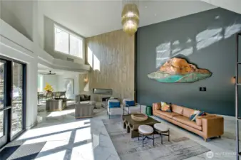 First impressions matter—and this one delivers.  Step inside the grand lobby of the Rainier building and you’ll feel the intention behind every detail. Artful design, soaring ceilings, and plenty of gathering space set the tone for an elevated experience. Whether you're welcoming friends or taking a moment for yourself before heading out, this entryway feels more like a boutique hotel than a typical condo.