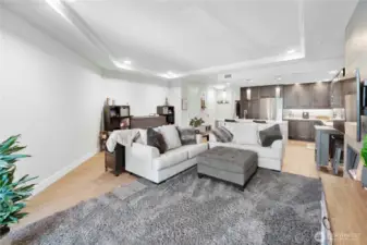 Room to breathe, space to grow.  With generous wall space and 9-foot ceilings, this living area feels far larger than its footprint. Create your own media zone, add a reading nook, or simply stretch out and enjoy the sense of openness—ideal for a remote workspace or unwinding after a walk along the waterfront.