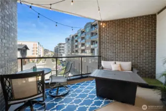 An outdoor extension of your living room.  This extra-large covered patio offers both charm and utility. Outfitted with string lights and ready for a fire table or morning espresso setup, it’s your private perch above the buzz of Ruston’s walkable core. From here, you’re just moments away from dining, shopping, and scenic trails.