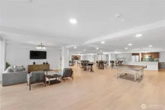 Space to gather, unwind, and connect.  This spacious community lounge is more than just a bonus—it's a social hub. With casual seating areas, a large TV, game tables, and open space to host events or unwind, this area brings residents together without leaving the building. Whether it’s a game night or a birthday celebration, it’s ready for anything.