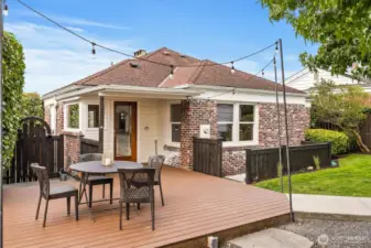 The concrete pad to the left of the backdoor is conveniently plumbed for a gas grill.