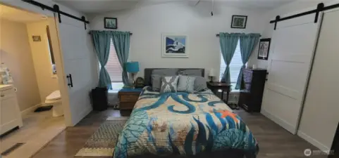 Primary bedroom with ensuite bathroom.