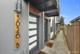 Main entry (lower level) opens into current Air BnB rental space.