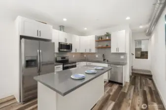 Huge center island also offers eating space.