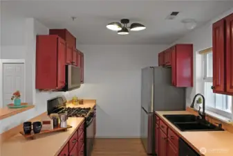 Another View of the Kitchen with Stainless Steel Appliances.