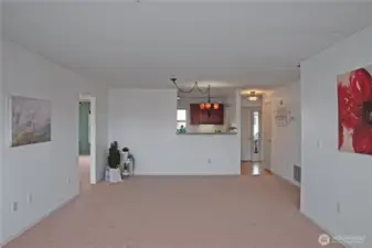 The kitchen connects to the living room!