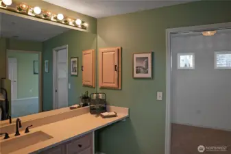 Primary Bathroom leading to Walk-in Closet.