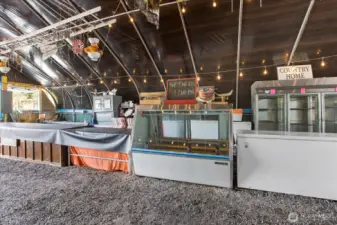 Countertop, refrigeration for the prepick flats of blueberries & freezer for those who wish to buy big bags of frozen blueberries too.