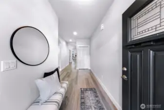 Space for either a welcoming bench or console table on the other wall