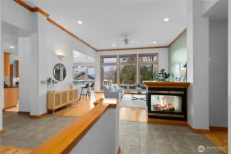 Entry and living area with high ceilings and natural light