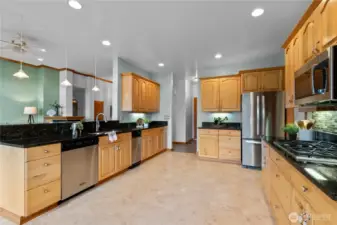 Kitchen and dining area with open flow to living spaces