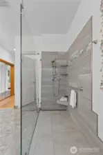 Zero barrier walk-in shower and glass enclosure.