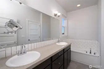 Primary bath, dual vanity and tub