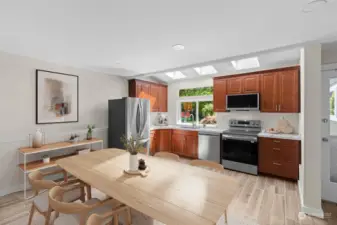 Kitchen and dining area - lower level (virtually staged)