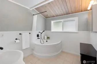 Unwind in comfort. After a paddle around the lake or a hike through nearby trails, return to a hot soak under the charm of a wood-paneled ceiling.