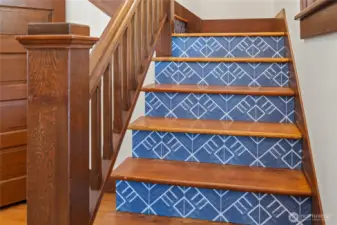 A nod to the home’s heritage with a fresh twist—the stairwell toe kicks feature decorative detailing that’s both stylish and whimsical, bringing unexpected charm and personality to the space with every step.